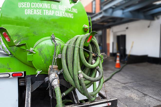 a large grease trap being pumped by a specialist in Branchburg, NJ