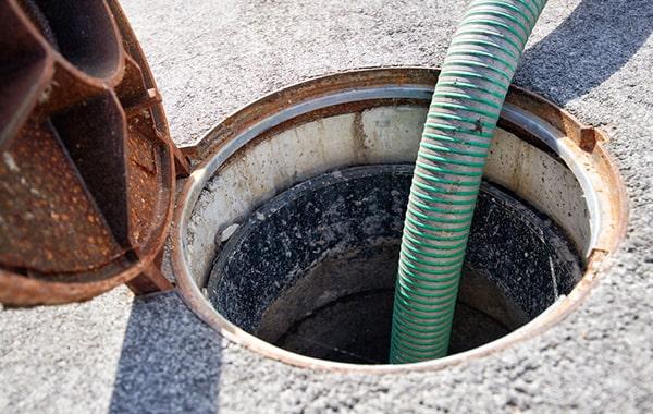 grease trap pumping includes removing built-up grease, oils, and fats from the trap to prevent clogs in the plumbing system